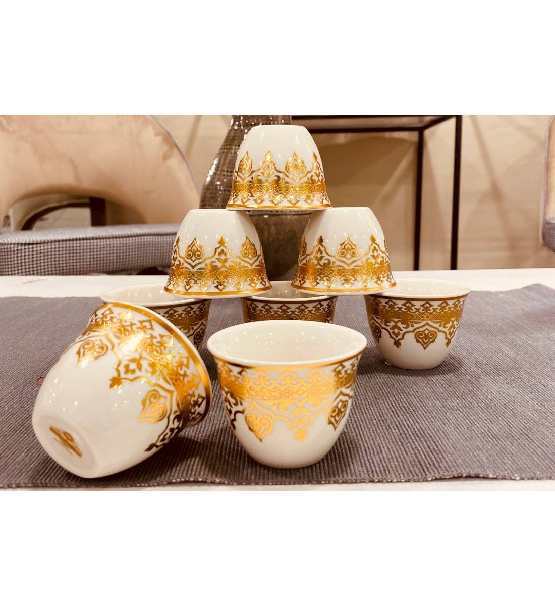 Set of 12 gilded ceramic cups