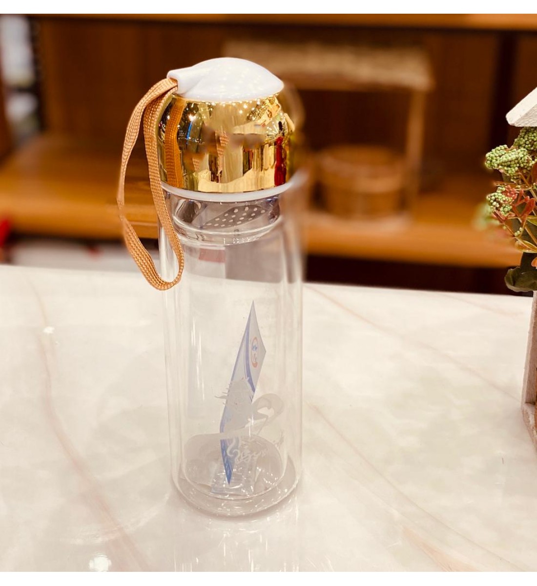 Glass flask with cover