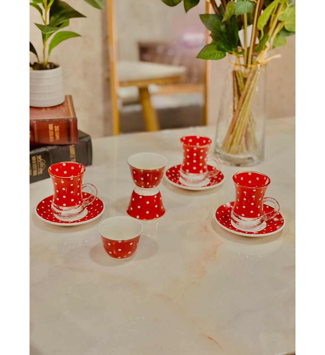 A set of 36 pieces of coffee cups, tea pods and serving saucers