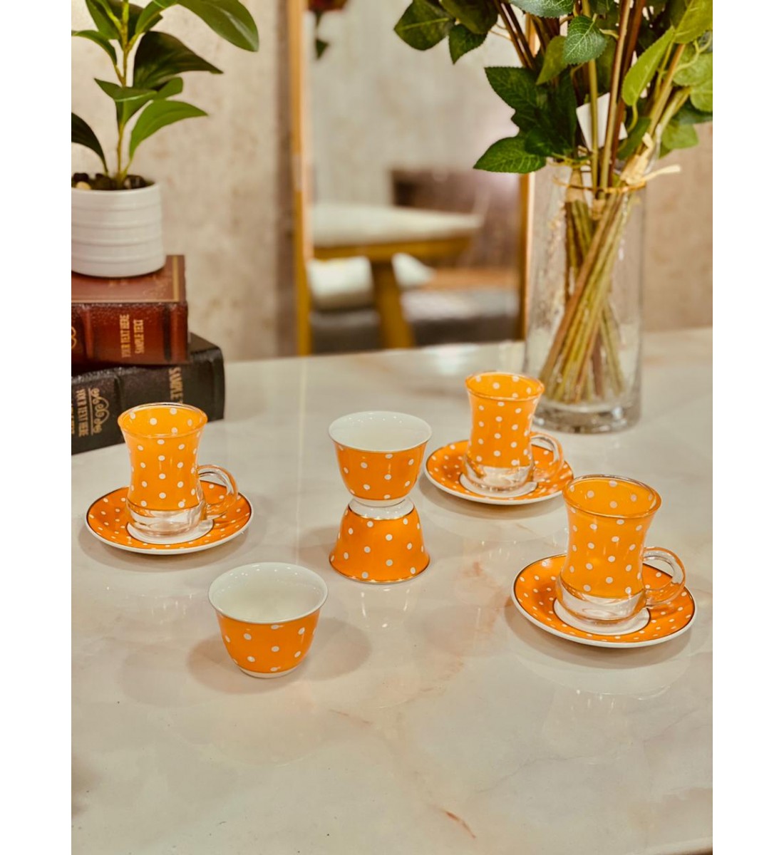 A set of 36 pieces of coffee cups, tea pods and serving saucers