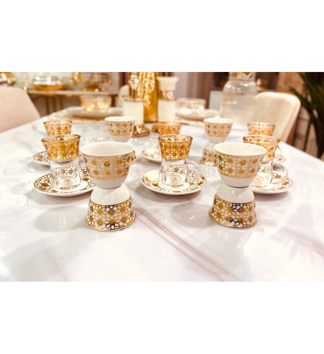 A set of 36 gilded cups and cups