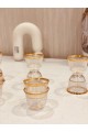 A set of white glass cups with a gilded pattern, 12 pieces