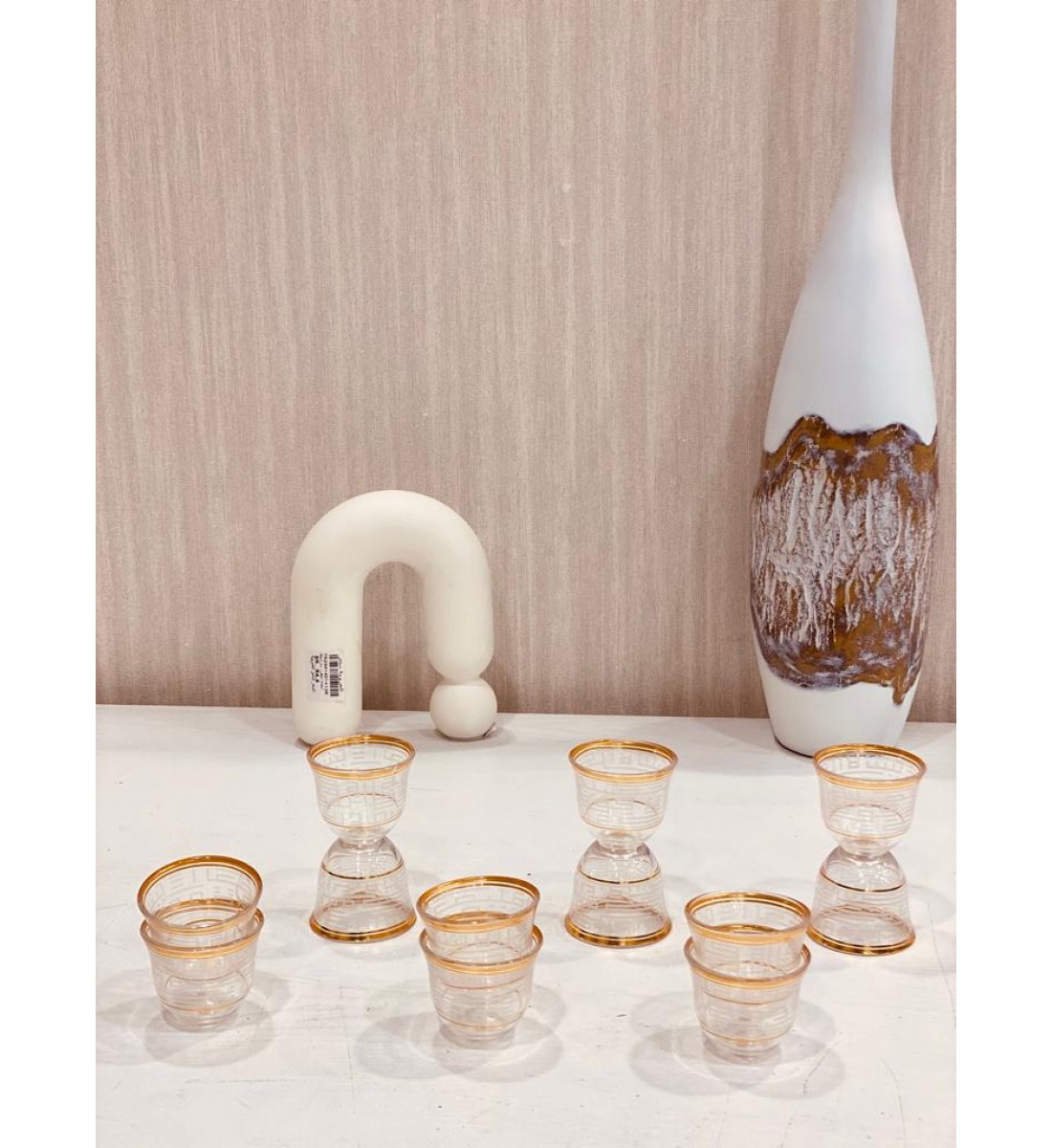 A set of white glass cups with a gilded pattern, 12 pieces