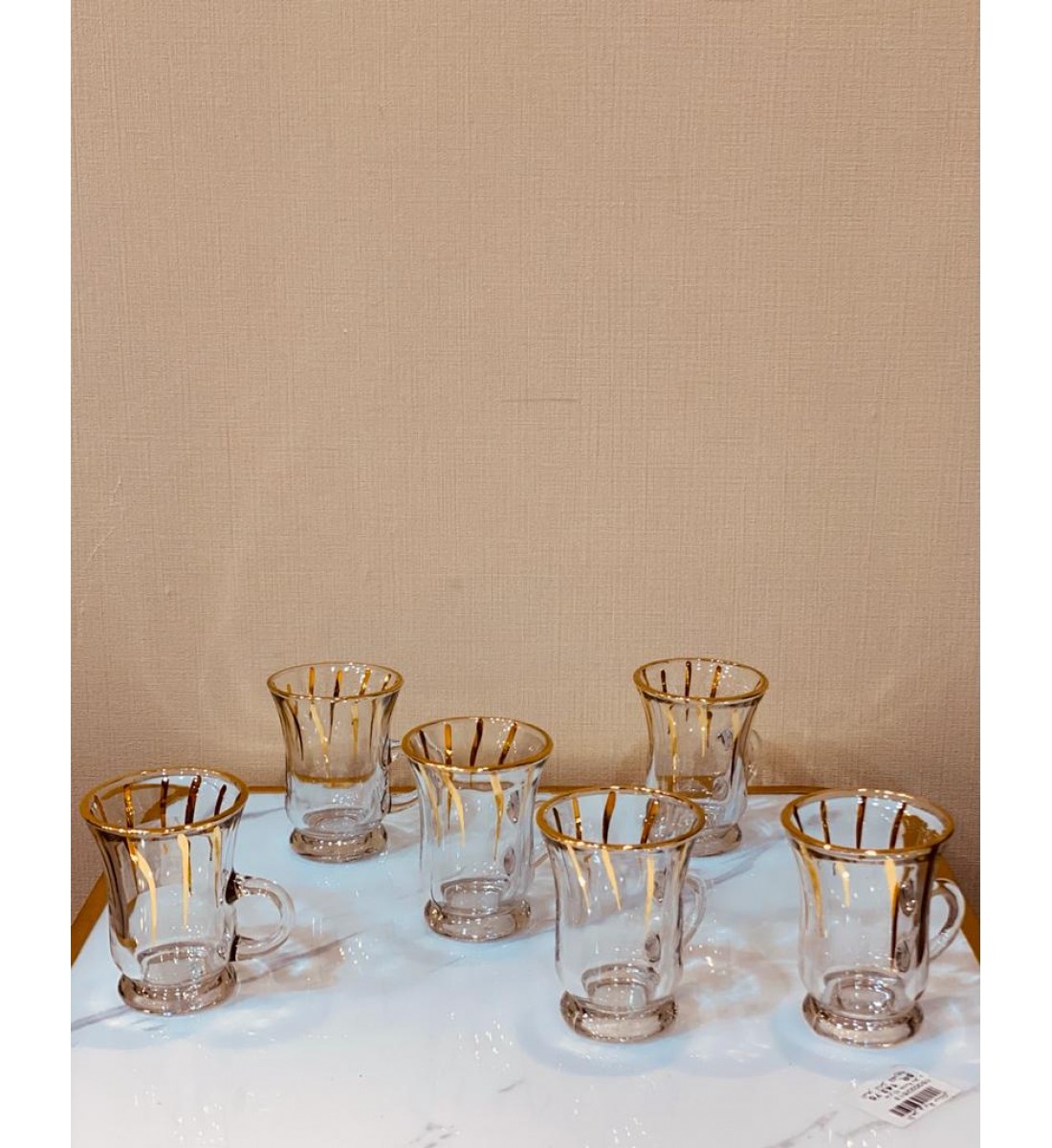 Glass tea bowls set with a gilded pattern, heavy material (6) pieces