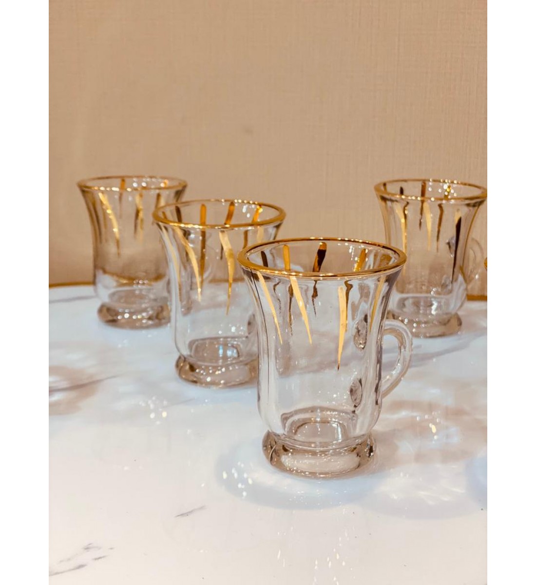 Glass tea bowls set with a gilded pattern, heavy material (6) pieces