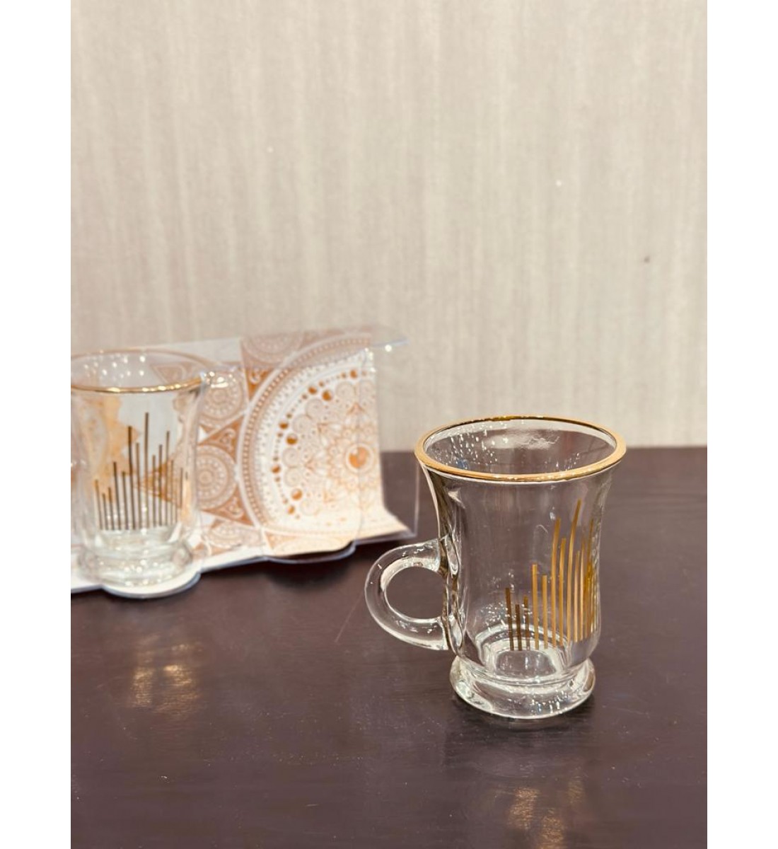 A set of glass tea bowls with a gilded line, of heavy material (6) pieces