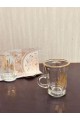 A set of glass tea bowls with a gilded line, of heavy material (6) pieces
