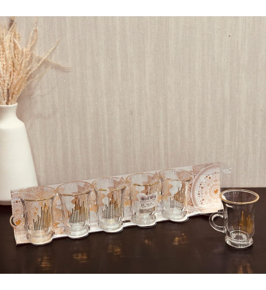 A set of glass tea bowls with a gilded line, of heavy material (6) pieces