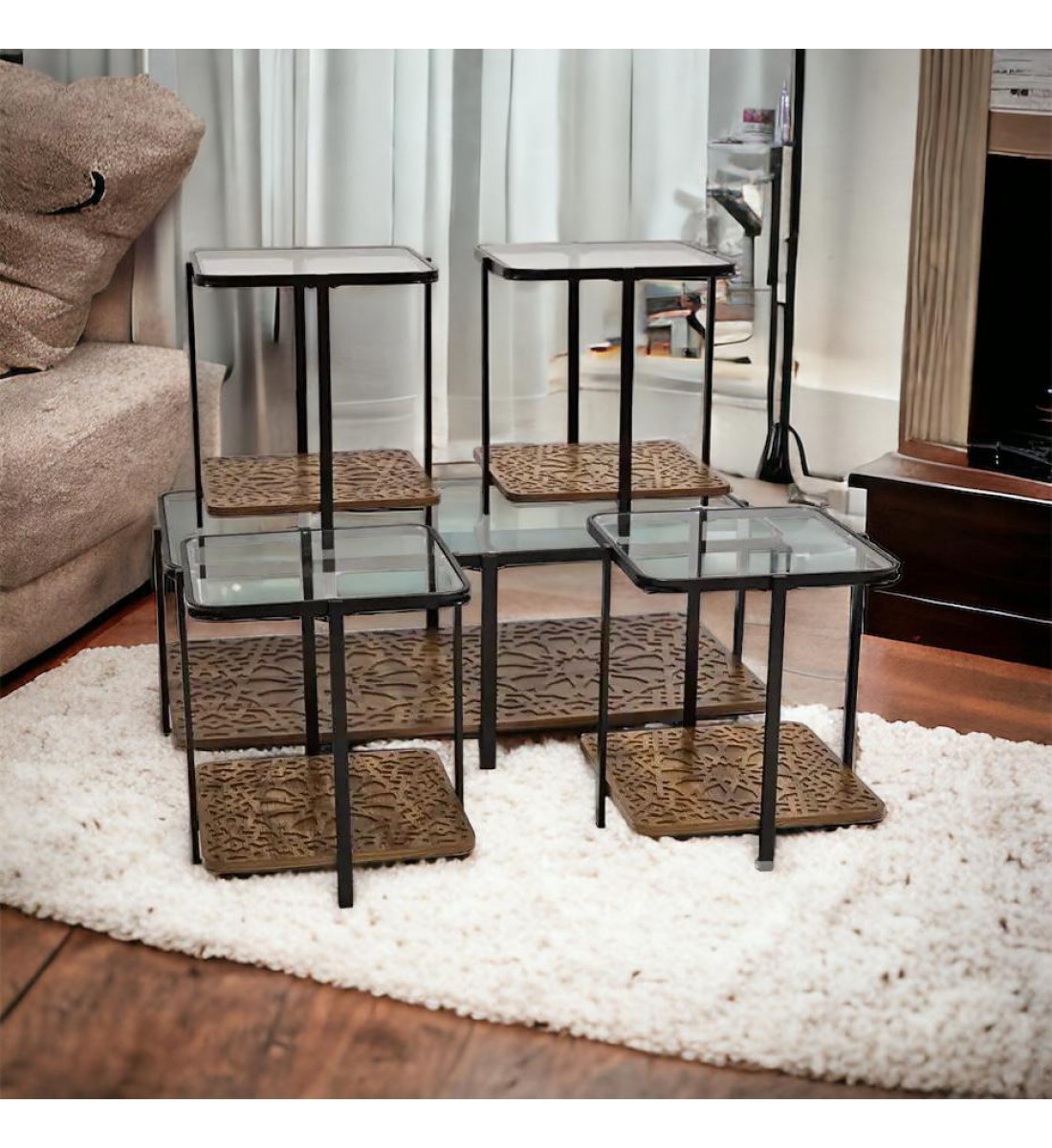 A set of glass tables with a wooden base, 5 pieces
