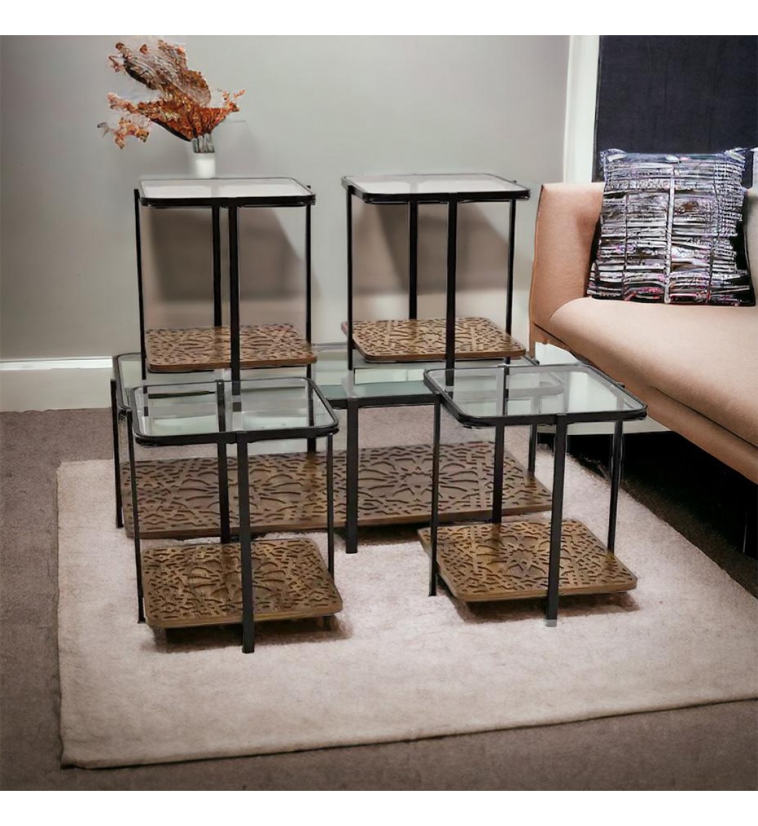 A set of glass tables with a wooden base, 5 pieces
