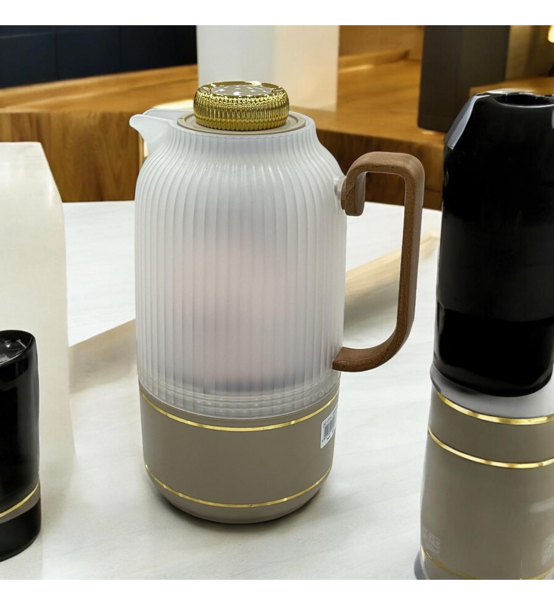 Single transparent thermos, beige on gold, 1 liter
