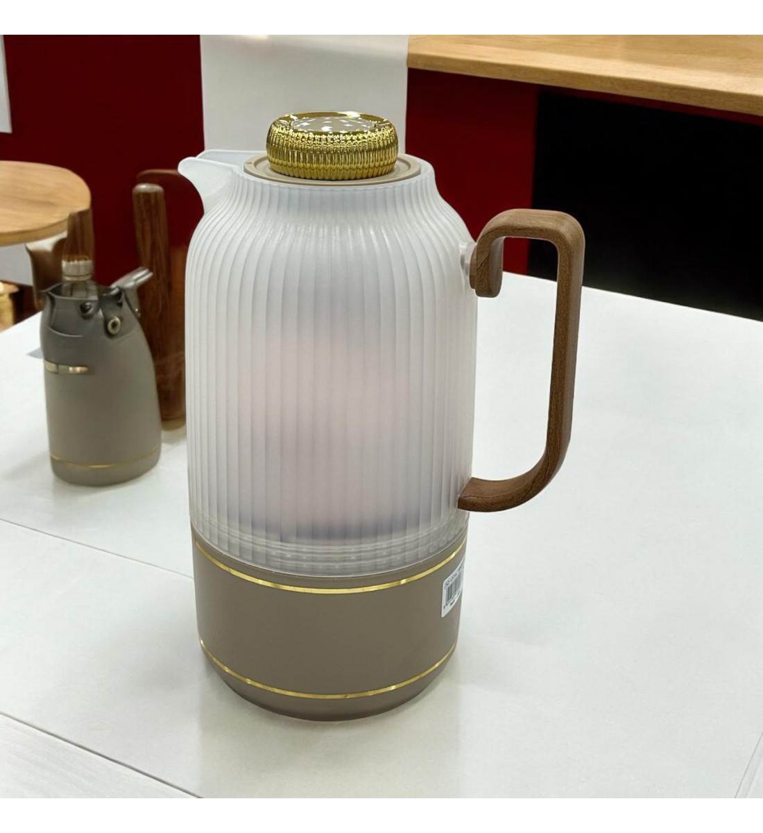 Single transparent thermos, beige on gold, 1 liter