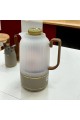 Single transparent thermos, beige on gold, 1 liter