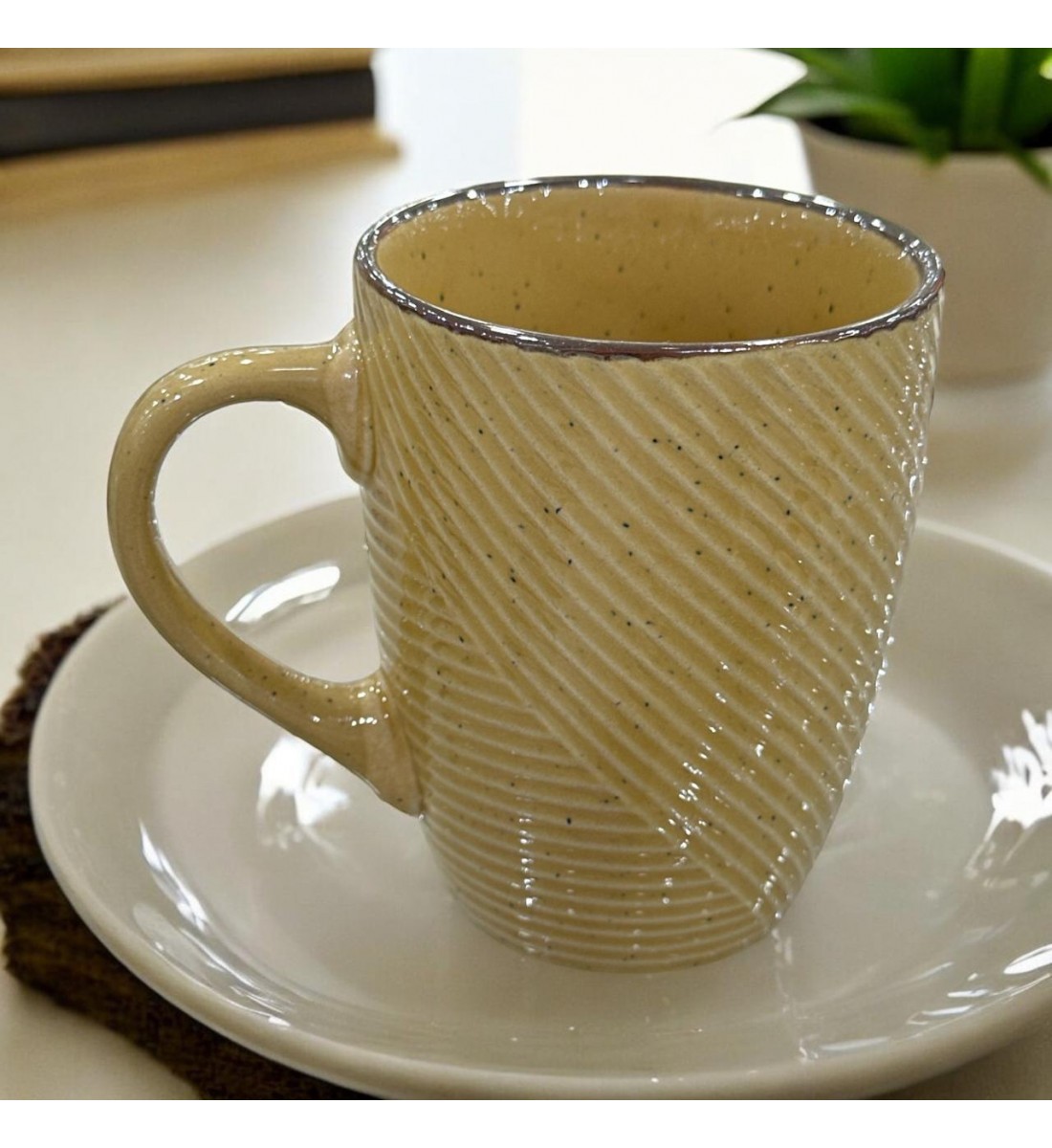 Ceramic mug for hot drinks, ribbed design, beige color, size 12x10 cm