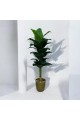 A tree decorated with a golden banana, approximately 140 cm