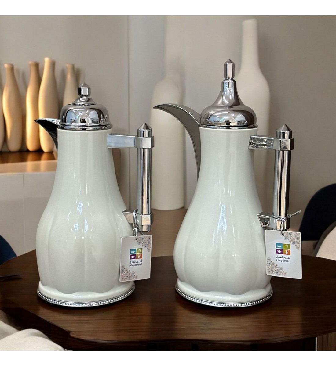 White silver tea and coffee thermos set with silver handle