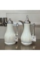 White silver tea and coffee thermos set with silver handle