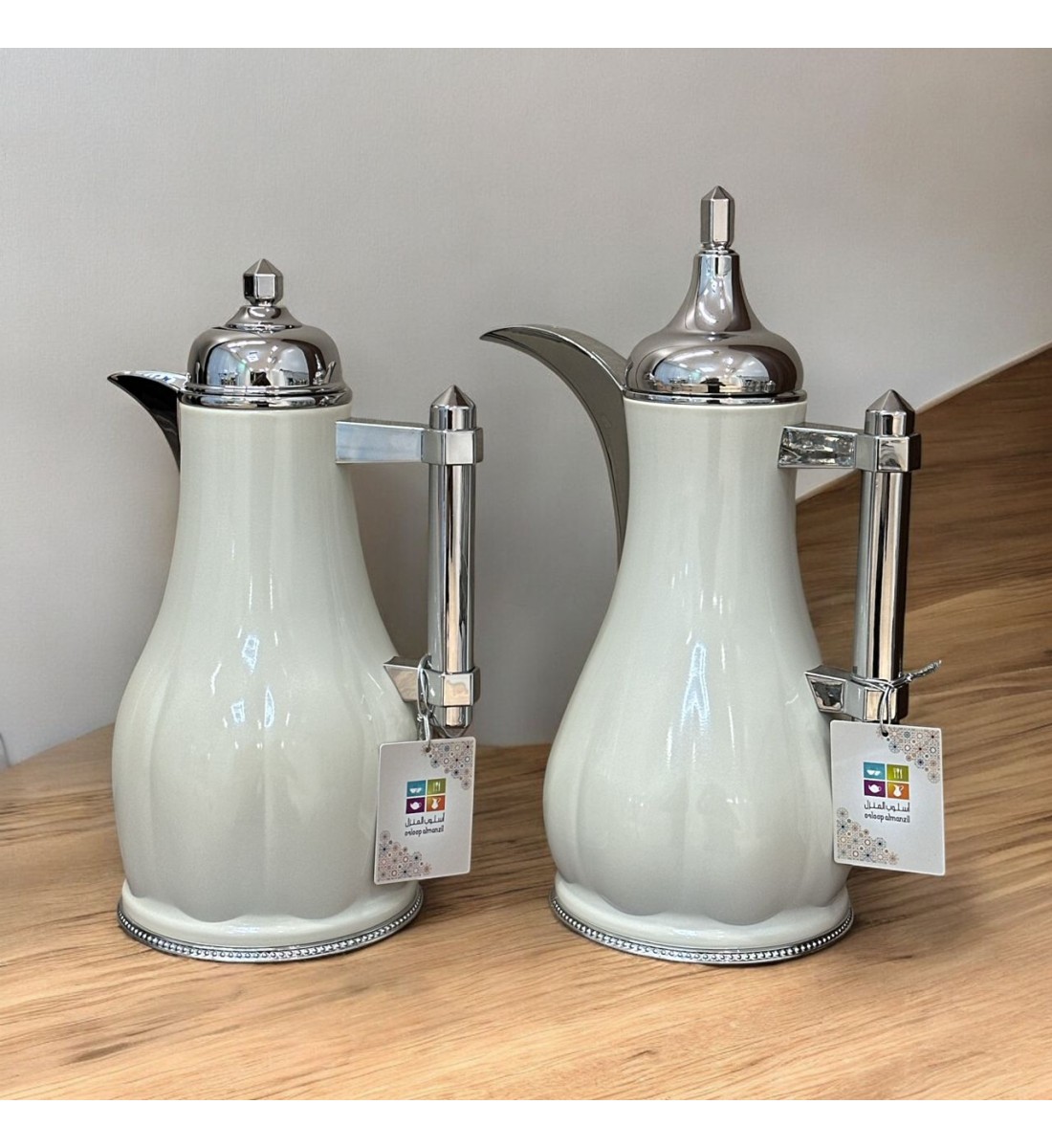 White silver tea and coffee thermos set with silver handle