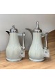 White silver tea and coffee thermos set with silver handle