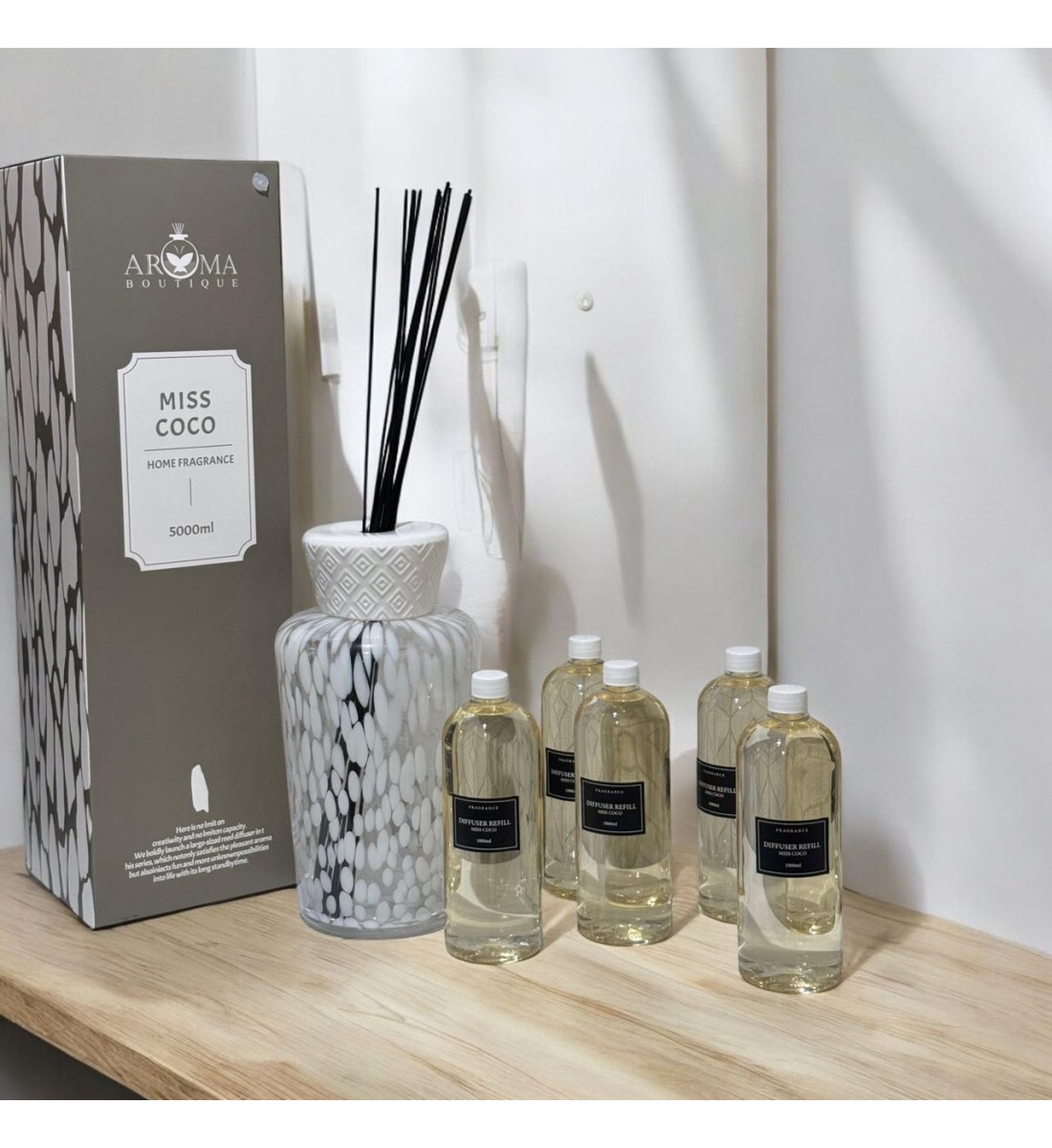 Diffuseur de parfum avec bâtonnets de verre 5000 ml au parfum de (MISS COCO)PARFUM D'INTÉRIEUR