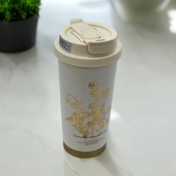 كوب حافظ للحرارة ستيل بمسكة لون بيج نقشة ذهبي 520ملي 