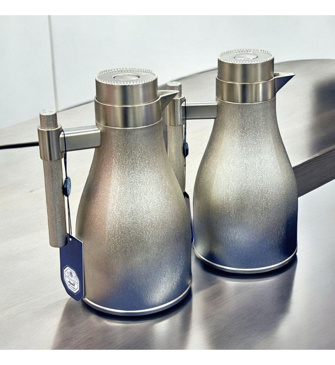 طقم ترمس اجوان فضي ذهبي  بلاستيك 2قطع 