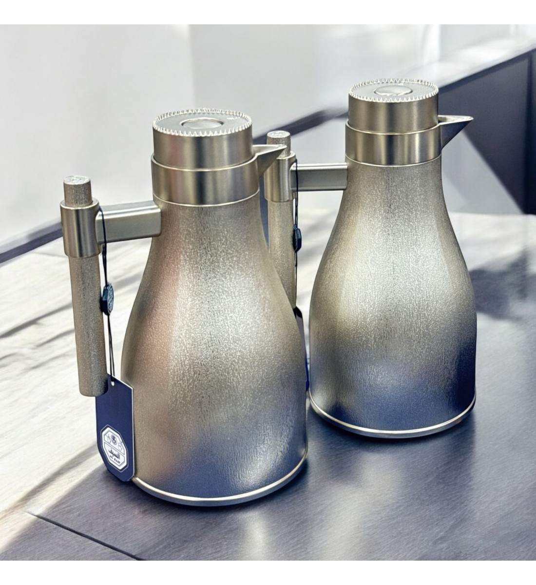 طقم ترمس اجوان فضي ذهبي  بلاستيك 2قطع 