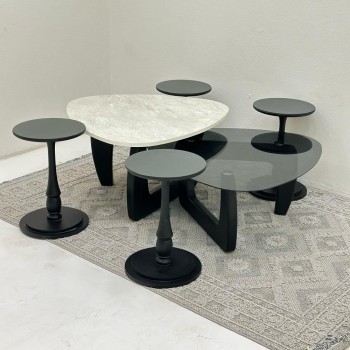 طقم طاولات 6قطع سطح الطاولة الاولى بديل حجر ملمس خشن والثانيه سطح زجاج قاعداتهما خشب لون اسود