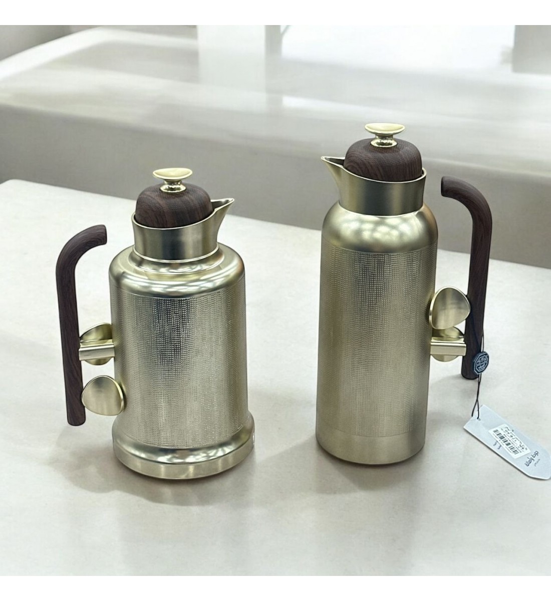 طقم ترمس شاي جلنار نيكل كروم ممسك خشبي 2قطع طقم ترمس شاي جلنار نيكل كروم ممسك خشبي 2قطع
