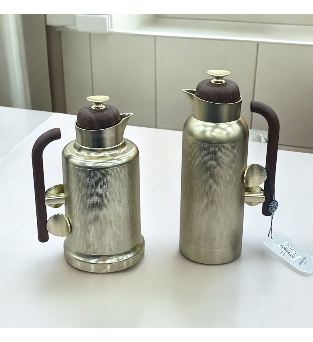 طقم ترمس شاي جلنار نيكل كروم ممسك خشبي 2قطع طقم ترمس شاي جلنار نيكل كروم ممسك خشبي 2قطع