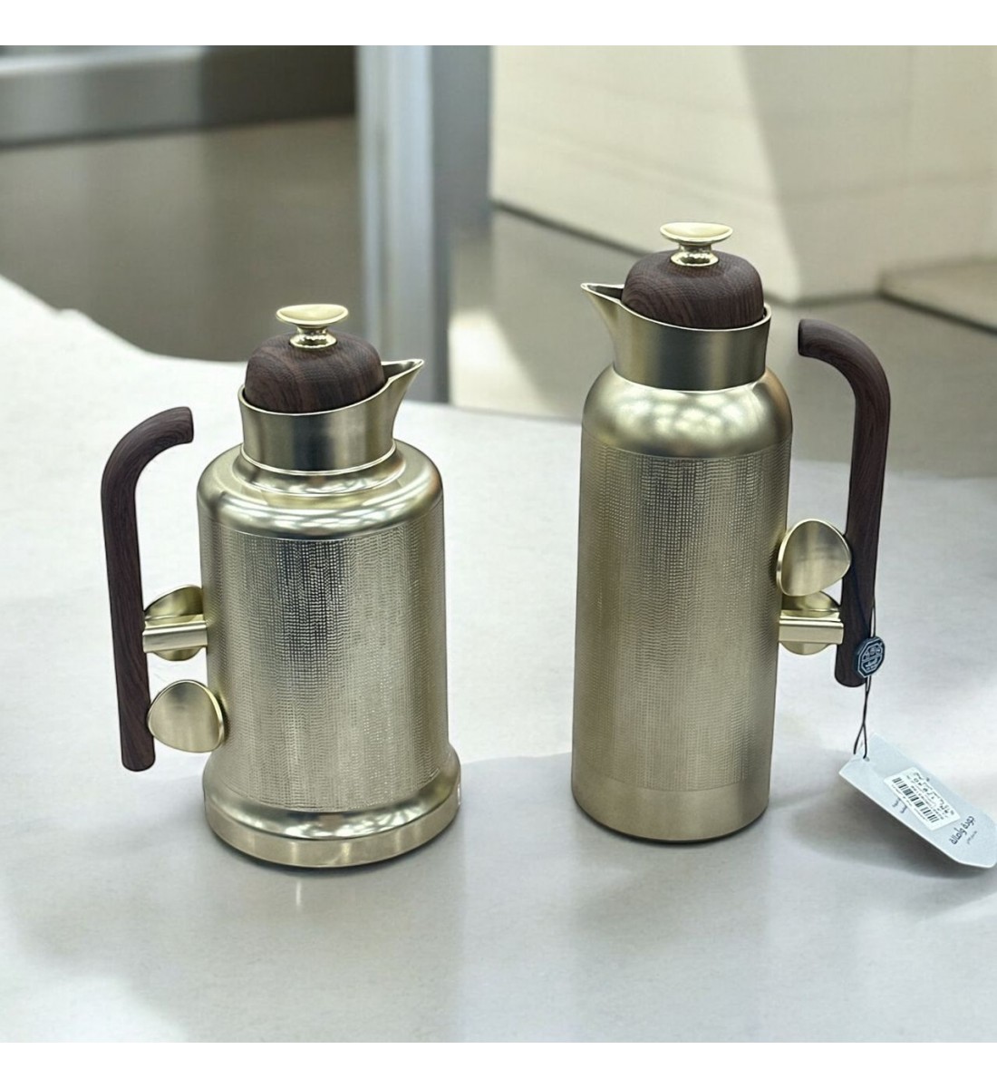 طقم ترمس شاي جلنار نيكل كروم ممسك خشبي 2قطع طقم ترمس شاي جلنار نيكل كروم ممسك خشبي 2قطع