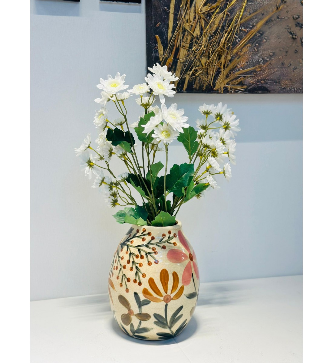 فازة ديكور بتصميم فني راقٍ تضيف لمسة من الأناقة والجمال لأي زاوية في منزلك.22×9×9سم 