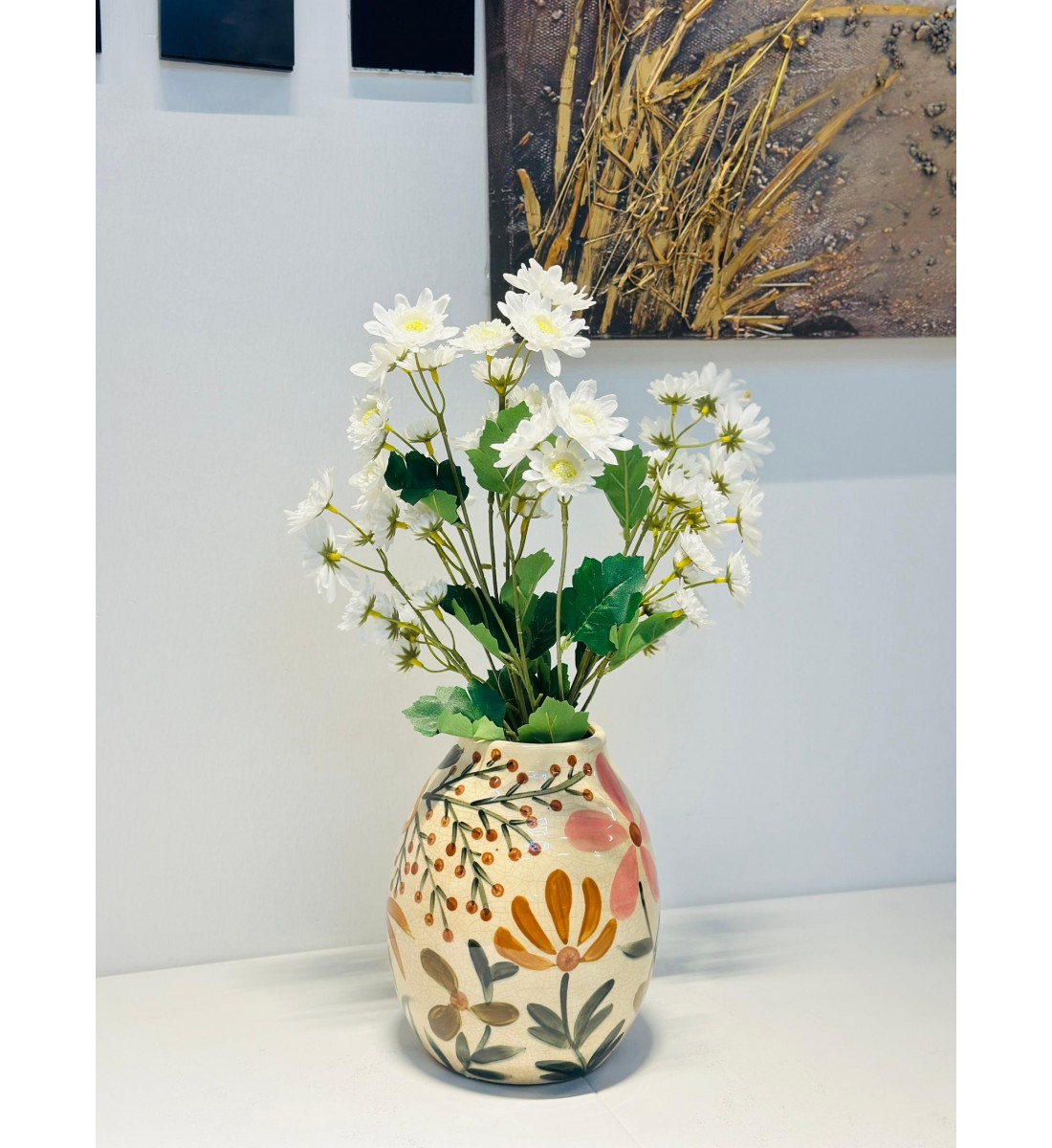 فازة ديكور بتصميم فني راقٍ تضيف لمسة من الأناقة والجمال لأي زاوية في منزلك.22×9×9سم 