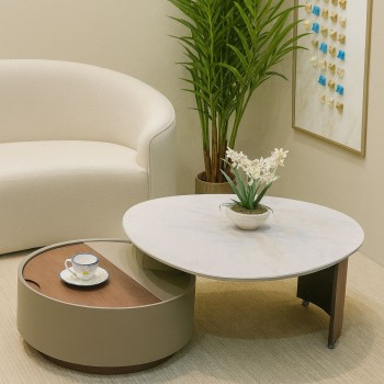 طاولة قهوة دائرية بتصميم عصري أنيق، تجمع بين السطح الرخامي الفاخر باللون الأبيض ذي العروق الهادئة