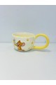 هذا كوب خزفي لطيف باللون العاجي الفاتح،مزين برسمة شخصية جيري الشهيرة من كرتون Jerry 