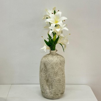 A decorative vase with a rough texture, resembling stone or concrete. It can be used as a decorative piece in the home or office. 34 x 4 x 4 cm