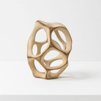 A ceramic decorative masterpiece with a hollow circular design, featuring subtle ripples that add an attractive artistic touch. 27 x 28 x 7 cm