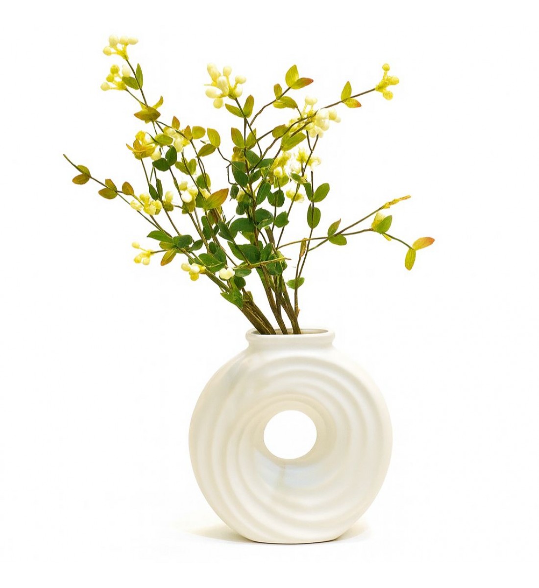 فازة فاخرة بتصميم عصري بسيط وأنيق، تأخذ شكلًا دائريًا مجوفًا من المنتصف مع تموجات انسيابية تضيف لمسة فنية راقية.19×8×5سم 