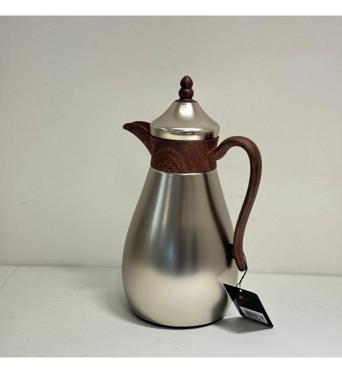 ترمس قمر استيل *فضي مطفي زجاج ممسك خشبي 1لتر ترمس قمر استيل *فضي مطفي زجاج ممسك خشبي 1لتر