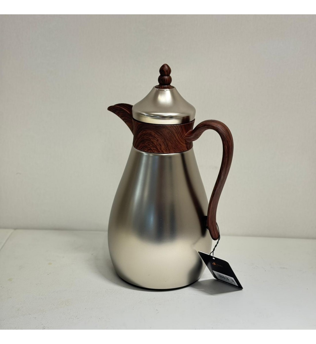 ترمس قمر استيل *فضي مطفي زجاج ممسك خشبي 1لتر ترمس قمر استيل *فضي مطفي زجاج ممسك خشبي 1لتر