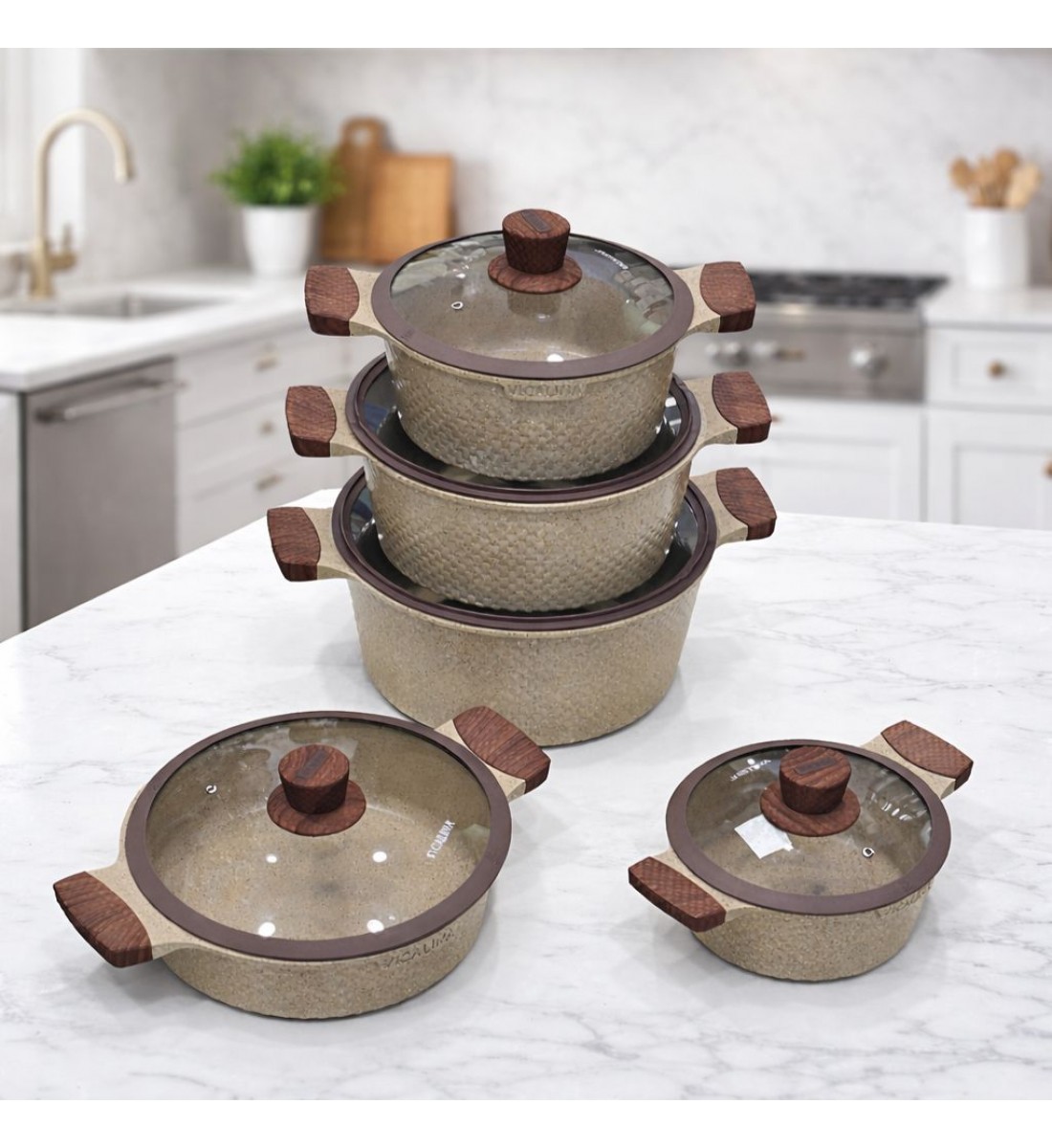 طقم قدور طبخ فاخر بتصميم أنيق يجمع بين الجمال والعملية، مصنوع من مواد عالية الجودة بلمسة حجرية مميزة تمنح توزيعًا متوازنًا للحرارة 10قطع طقم قدور طبخ فاخر بتصميم أنيق يجمع بين الجمال والعملية، مصنوع من مواد عالية الجودة بلمسة حجرية مميزة تمنح توزيعًا متوازنًا للحرارة 10قطع