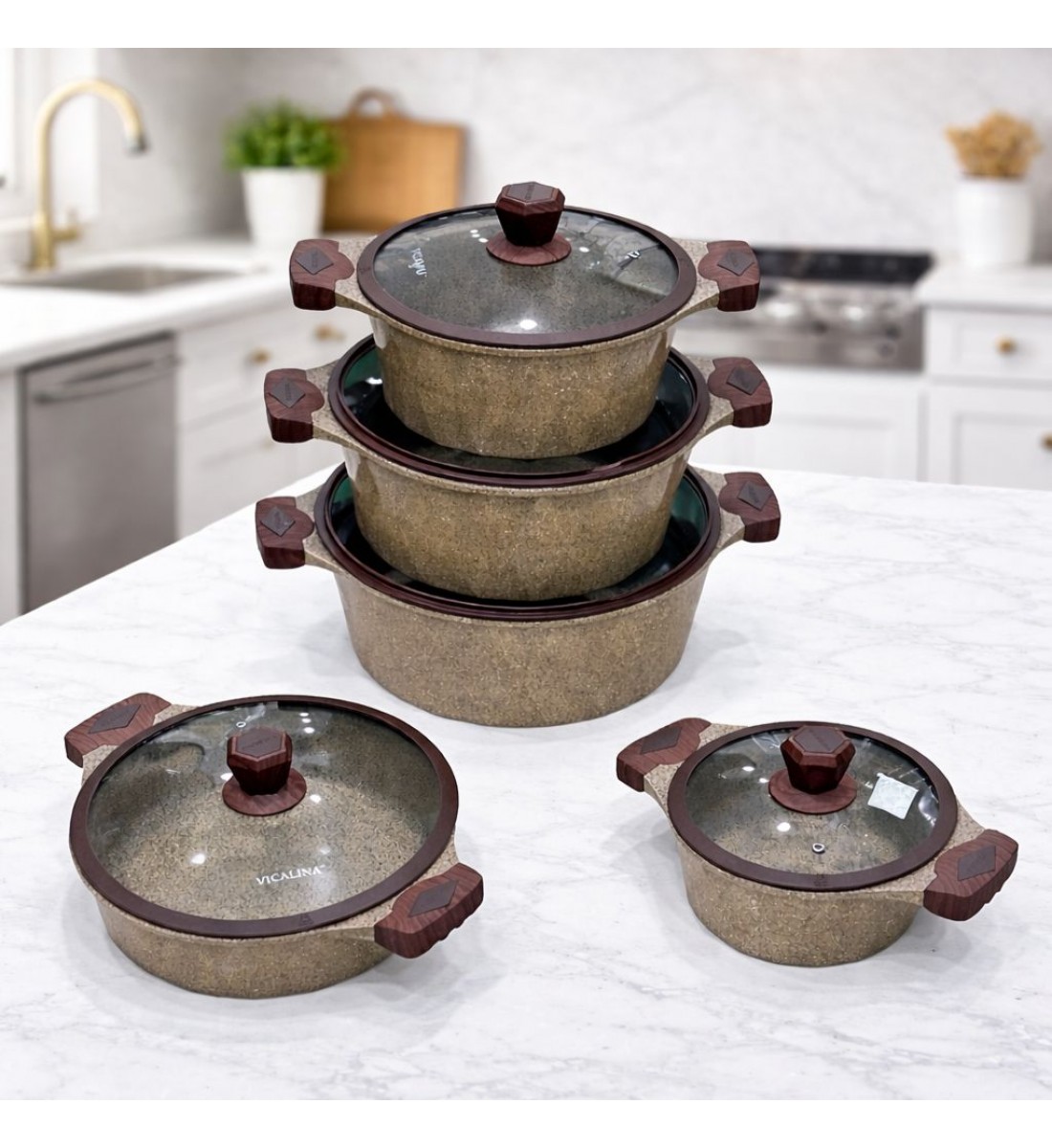 طقم قدور طبخ فاخر بتصميم أنيق يجمع بين الجمال والعملية، مصنوع من مواد عالية الجودة بلمسة حجرية مميزة تمنح توزيعًا متوازنًا للحرارة 10قطع طقم قدور طبخ فاخر بتصميم أنيق يجمع بين الجمال والعملية، مصنوع من مواد عالية الجودة بلمسة حجرية مميزة تمنح توزيعًا متوازنًا للحرارة 10قطع