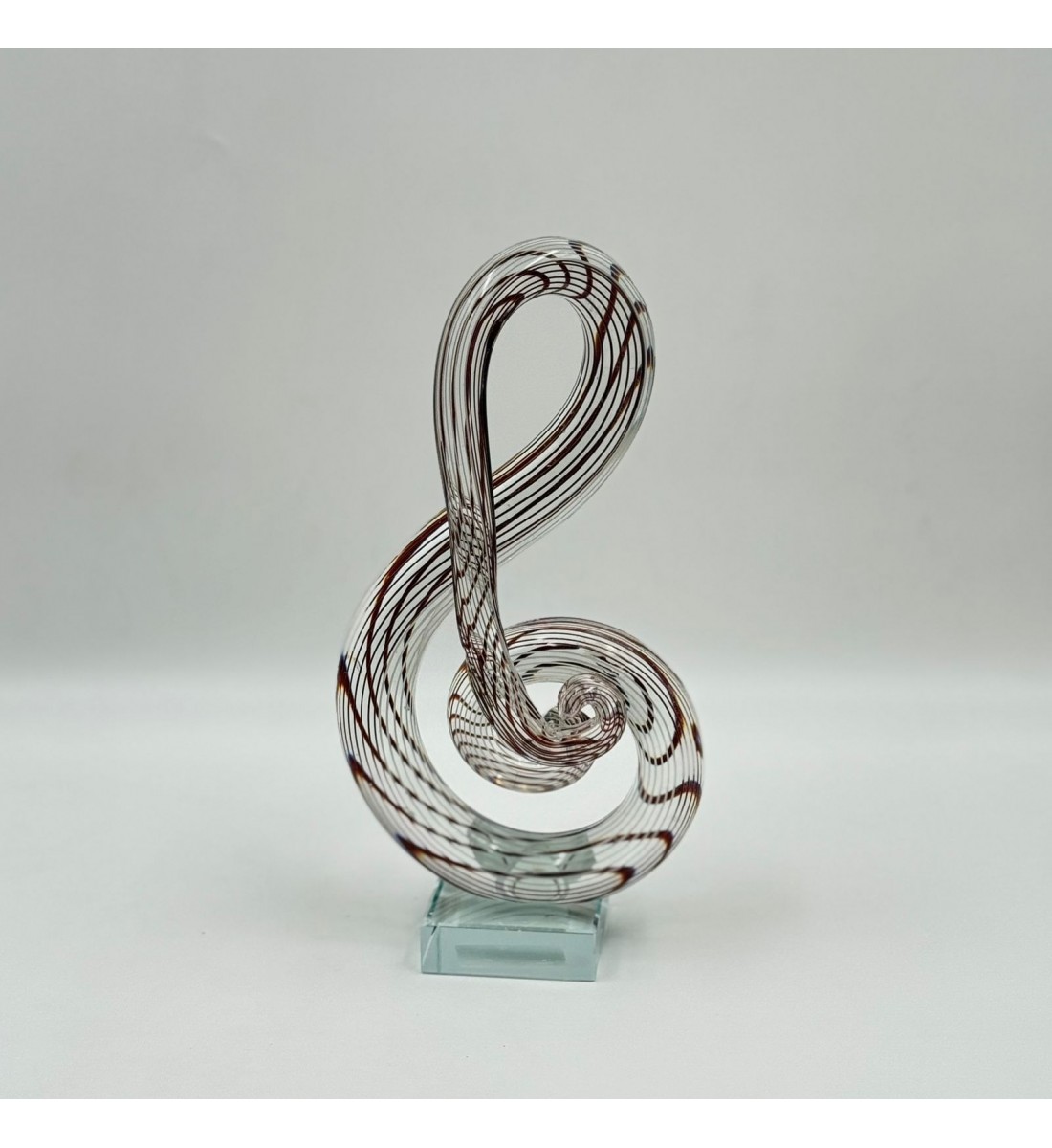  قطعة ديكور فنية مصنوعة من الزجاج الشفاف بتصميم انسيابي مستوحى من رمز النغمة الموسيقية،24×12×6سم 