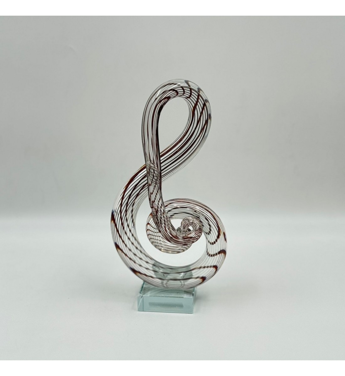 قطعة ديكور فنية مصنوعة من الزجاج الشفاف بتصميم انسيابي مستوحى من رمز النغمة الموسيقية،24×12×6سم 