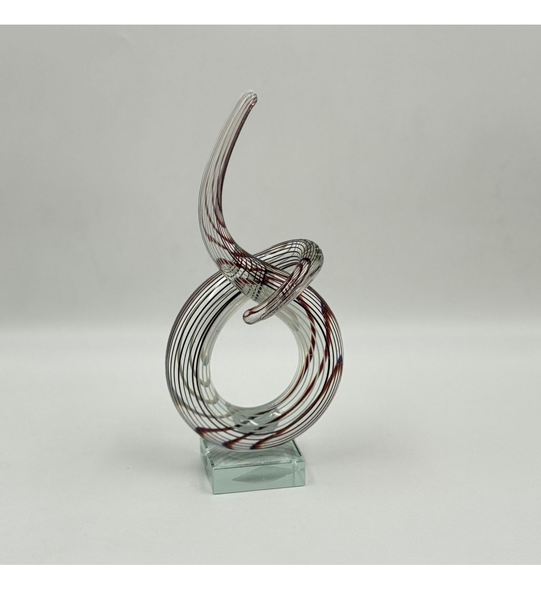  قطعة ديكور فنية مصنوعة من الزجاج الشفاف بتصميم انسيابي مستوحى من رمز النغمة الموسيقية،24×12×6سم 