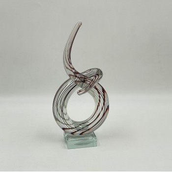  قطعة ديكور فنية مصنوعة من الزجاج الشفاف بتصميم انسيابي مستوحى من رمز النغمة الموسيقية،24×12×6سم 
