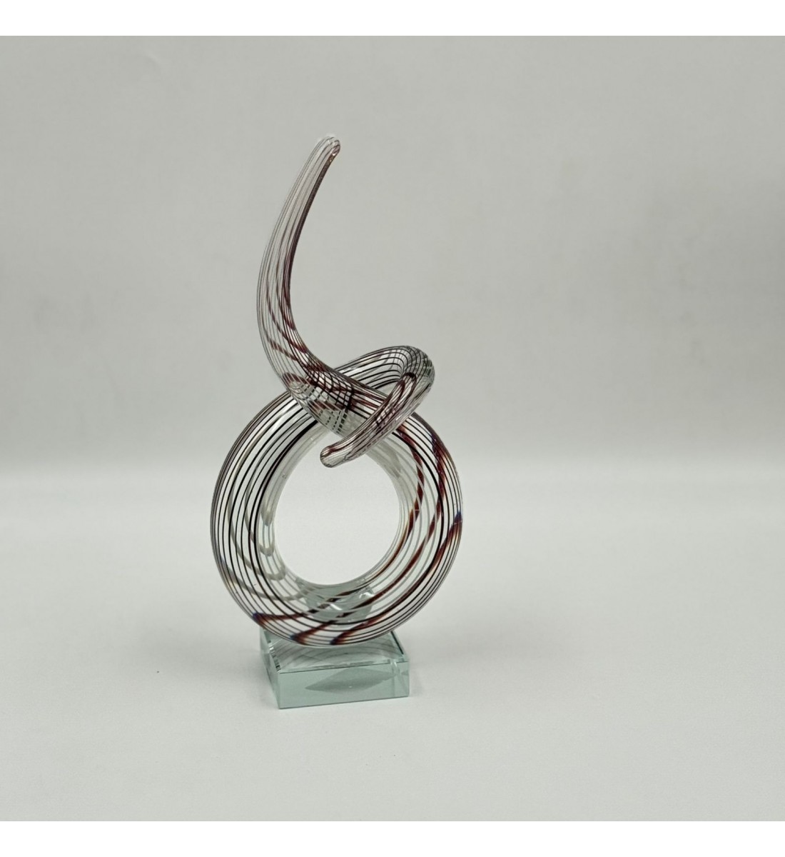 قطعة ديكور فنية مصنوعة من الزجاج الشفاف بتصميم انسيابي مستوحى من رمز النغمة الموسيقية،24×12×6سم 