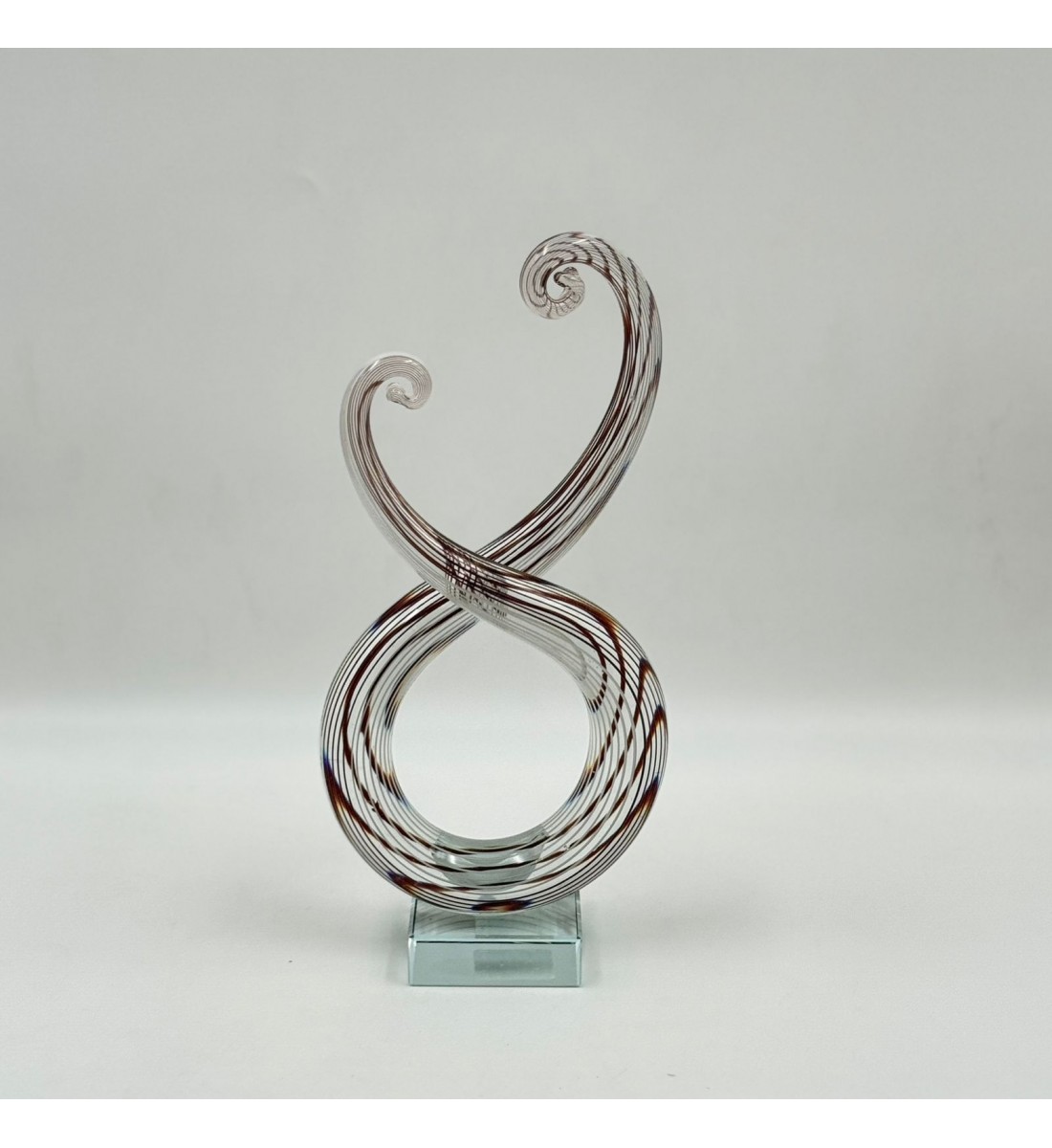  قطعة ديكور فنية مصنوعة من الزجاج الشفاف بتصميم انسيابي مستوحى من رمز النغمة الموسيقية،24×12×6سم 