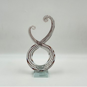  قطعة ديكور فنية مصنوعة من الزجاج الشفاف بتصميم انسيابي مستوحى من رمز النغمة الموسيقية،24×12×6سم 