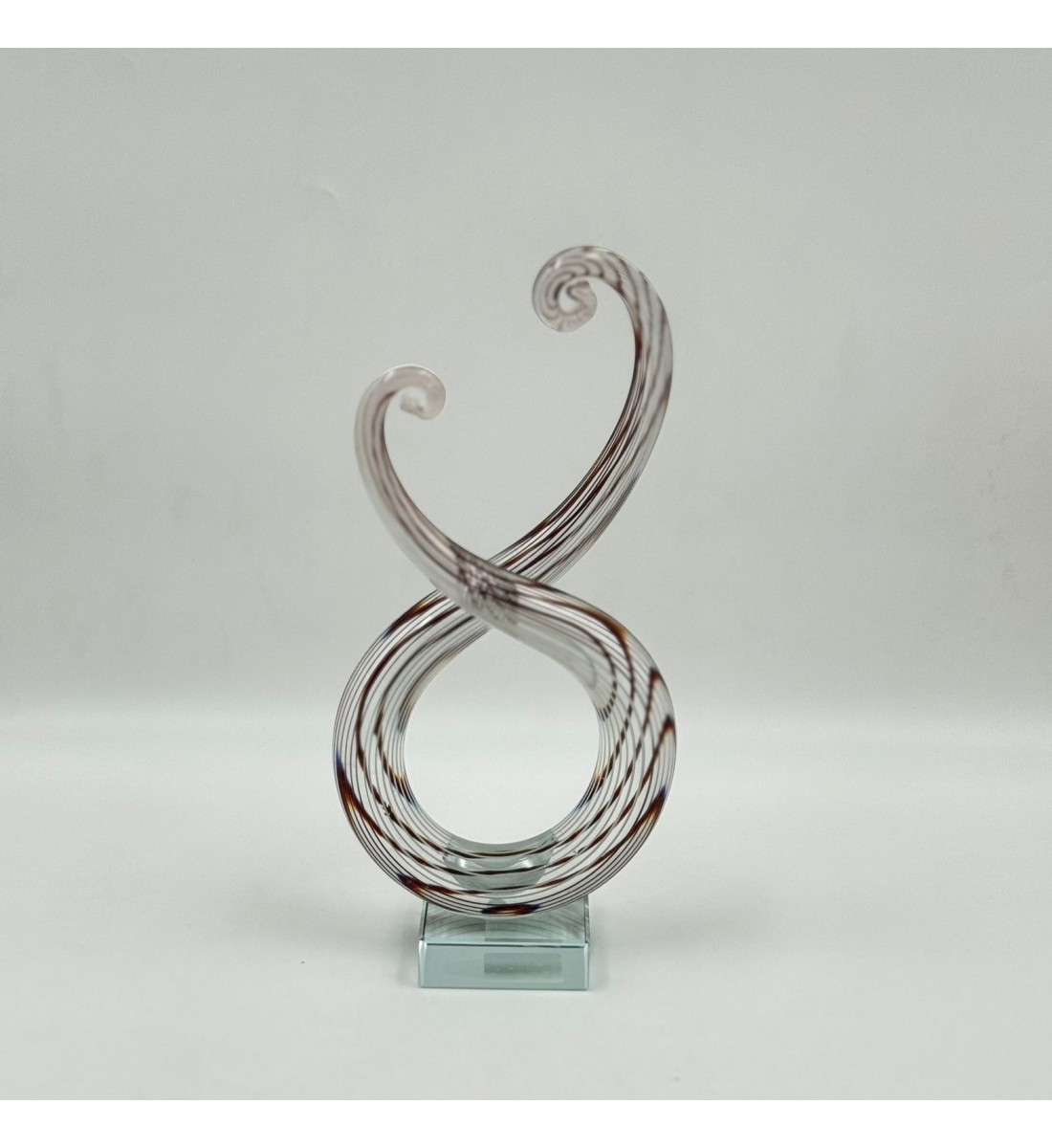  قطعة ديكور فنية مصنوعة من الزجاج الشفاف بتصميم انسيابي مستوحى من رمز النغمة الموسيقية،24×12×6سم 